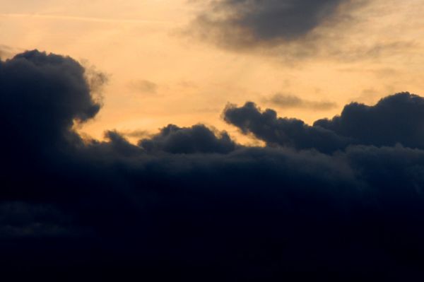 Dark cloud on yellow sky